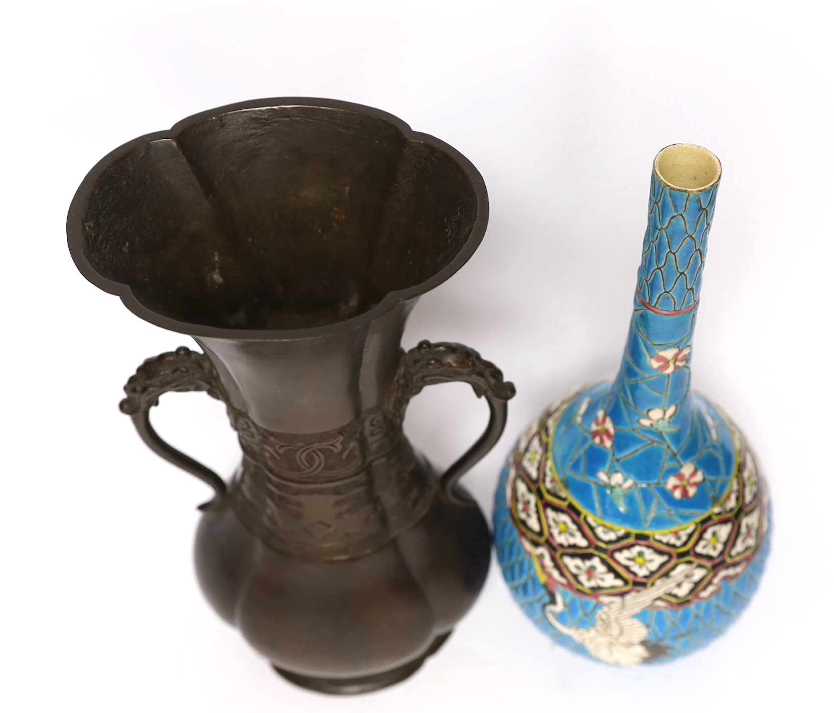 A 19th century Japanese bronze flower vase, with a Japanese enamelled pottery bottle, Meiji, tallest 27 cm (2)